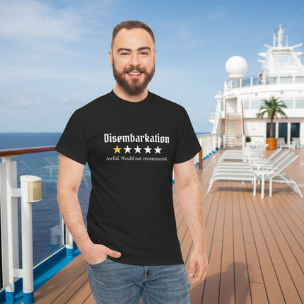 Man wearing a black t-shirt with text  that says "Disembarkation and a 1-star rating on a ship deck