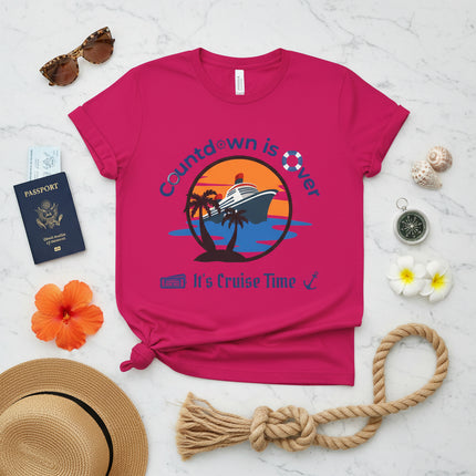Pink t-shirt with a cruise-themed graphic and text on a white background
