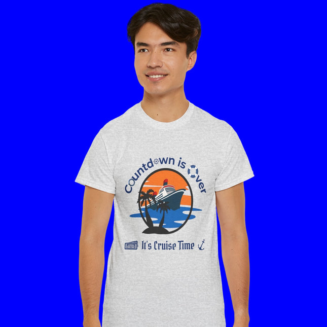 Person wearing a t-shirt with a cruise-themed graphic design on a blue background. Shirt says Countdown is Over, It's Cruise Time.