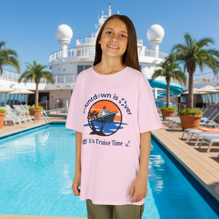 Young girl wearing a pink t-shirt with a cruise ship graphic design and text 'Countdown is Over It's Cruise Time'