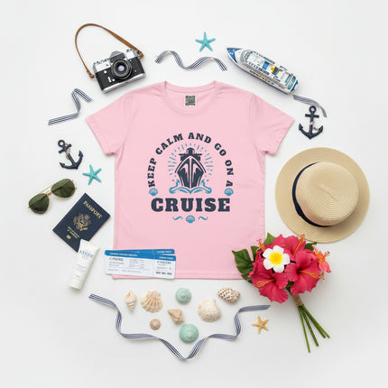 Pink t-shirt with 'Keep Calm and Go on a Cruise' text and ship graphic on a white background
