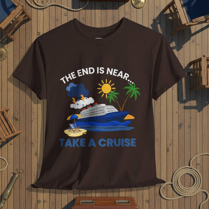Brown t-shirt with a graphic design of a cruise ship, sun, palm trees, and "The End Is Near... Take a Cruise" text