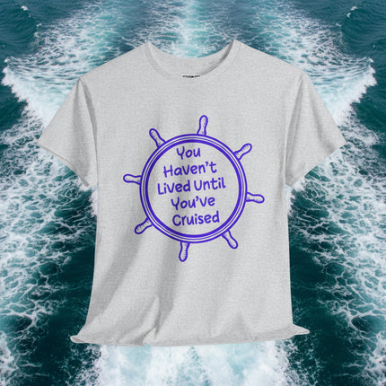 gray t-shirt with purple graphic and "You Haven't Lived Until You've Cruised" text on a boat with ocean and sky background