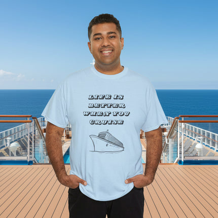 Man wearing a light blue t-shirt with a cruise ship graphic and "Life is Better When You Cruise" text.